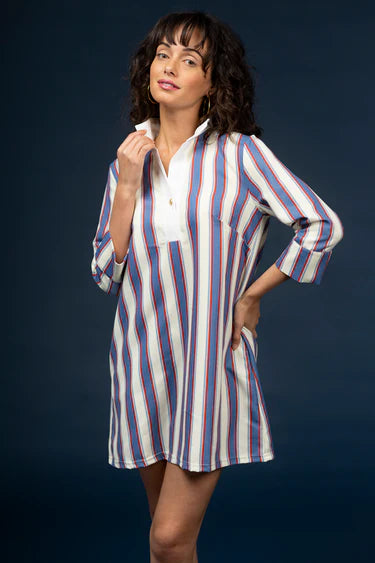 Timeless charm meets modern ease in the Martha Dress by Smith & Quinn. Designed in the cheerful Cottage Stripe print, this dress features a flattering V-neckline, tailored bodice, and gently flared skirt that moves with grace. Crafted from Smith & Quinn’s signature stretch fabric, it offers wrinkle resistance and all-day comfort—perfect for warm-weather outings, garden parties, or casual brunches.