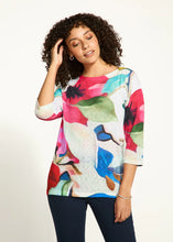 Load image into Gallery viewer, Exude confidence in this striking drop shoulder boat-neck top in a brilliant abstract floral pattern. Crafted from drapey twill, the relaxed fit provides unparalleled comfort. Its flattering silhouette effortlessly complements any look, whether it be with distressed denim or tailored twill.
