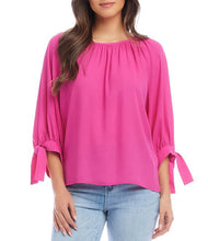 Load image into Gallery viewer, Enhance your wardrobe with this scoop neck peasant top that features ties on roll sleeves. Made from luxurious silky crepe polyester with an elegant drape, it can be your go-to choice for both casual and chic occasions.
