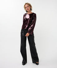 Load image into Gallery viewer, Woman wearing a maroon sequin blouse, black pants and black flats against a white background.
