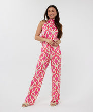 Load image into Gallery viewer, The EsQualo Tirsa Top Halter Disco Spark is a dazzling statement piece designed for effortless elegance and modern flair. Featuring a halter neckline and a vibrant print, this top offers a chic and sophisticated silhouette, perfect for both casual and dressy occasions. Pairs effortlessly with tailored pants, skirts, or denim for a stylish look.
