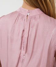 Load image into Gallery viewer, Sleek, soft, and summer-ready—the Svea Halter Top brings effortless elegance to any warm-weather look. Crafted from EsQualo’s signature silky-touch fabric in a dreamy pastel pink, it features a halter neckline with delicate gathering and a flowing, relaxed silhouette. Lightweight and breezy, it’s perfect for layering under a blazer or pairing with the matching silky cargos for a chic tonal ensemble.
