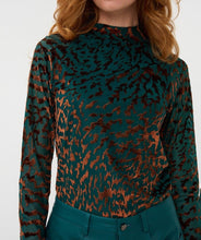 Load image into Gallery viewer, Woman wearing an animal print top in burnout velvet in teal and brown and teal pants against a white background.
