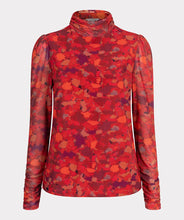 Load image into Gallery viewer, Who says winter has to be drab? Enhance your winter wardrobe with a touch of color. This stunning top features a vibrant multi color design that pairs well with denim or black pants. Wear it solo or layer it under a black blazer for a sophisticated look.
