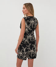 Load image into Gallery viewer, Woman wearing a black sleeveless top with off-white floral embroidery and matching shorts against a white background.
