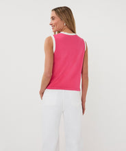 Load image into Gallery viewer, Woman wearing a pink sleeveless top with off-white trim and white pants on a plain background.
