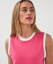 Load image into Gallery viewer, Woman wearing a pink sleeveless top with white trim against a plain background.
