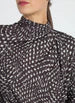 Load image into Gallery viewer, The Topacio Embellished High Neck Blouse, crafted from silky printed lightweight satin, features precise construction, crystal rhinestone adornments, and a back keyhole with a self-covered button. The crystals, applied exclusively to the front panel, are heat-set following the pattern cutting.
