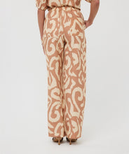 Load image into Gallery viewer, The EsQualo Trousers Solar Swing are stylish and comfortable pants featuring an all-over print design, wide legs, and side pockets for functionality. They come with two welt pockets at the back and an elastic waistband with a drawstring, accented with gold beading for a chic touch. A perfect pant for warm days, the Toma offers a lightweight and breathable fit.
