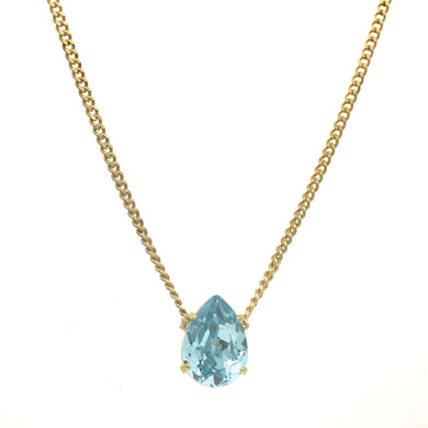 Introducing the Lumi necklace, a dazzling and versatile piece adorned with a high quality pear-shaped stone in the middle. This antique gold-plated necklace features a 14” length with a 3” extension. Handcrafted in Canada.    Color- Gold and turquoise. Premium crystals. Tear drop in turquoise. Gold chain. Length- 14 inches with 3-inch extension. 