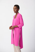 Load image into Gallery viewer, This stylish cover-up/cardigan features extended side openings and flared sleeves that impart a sense of fluidity and grace while in motion. The decorative studs along the openings add a touch of bold sophistication, making it perfect for both professional and casual settings.  Color- Ultra pink. Drape silhouette. No pockets. No zipper. Not lined. Side splits lined with silver hardware.
