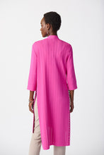 Load image into Gallery viewer, This stylish cover-up/cardigan features extended side openings and flared sleeves that impart a sense of fluidity and grace while in motion. The decorative studs along the openings add a touch of bold sophistication, making it perfect for both professional and casual settings.  Color- Ultra pink. Drape silhouette. No pockets. No zipper. Not lined. Side splits lined with silver hardware.
