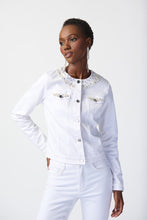Load image into Gallery viewer, Upgrade your denim repertoire with this exquisite denim jacket. While maintaining the classic appeal of a timeless denim jacket, this high-end piece adds a touch of chic elegance with its modern crewneck collar and embellished pocket flaps.  Color - Vanilla. Denim. Embellished crewneck. Long sleeves. Two embellished pockets. Nine front buttons. Unlined.
