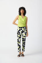 Load image into Gallery viewer, Introducing the Amaya Abstract Print Millennium Pull-On Pants by Joseph Ribkoff. Designed with a structured contour waistband and a stylish JR ornament, these cropped pants offer sophistication and comfort. Crafted from high-quality fabric, they provide both luxury and fun. Elevate your wardrobe with these bold and stylish pants.  Color - Vanilla Multi - Key lime, black and vanilla. Millennium fabric. Structured contoured waistband. JR ornament detail. Unlined.
