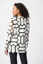 Load image into Gallery viewer, Indulge in the irresistible charm of this laser-cut mesh jacket. It is a modern work of art made from premium leatherette that blends futuristic style with refined sophistication. The jacket flaunts a hook-and-eye front closure, emphasizing its contemporary aesthetic.  Color- Vanilla and black. Leatherette and mesh fabric. Notched collar. Long sleeves. Hook-and-eye front closure.
