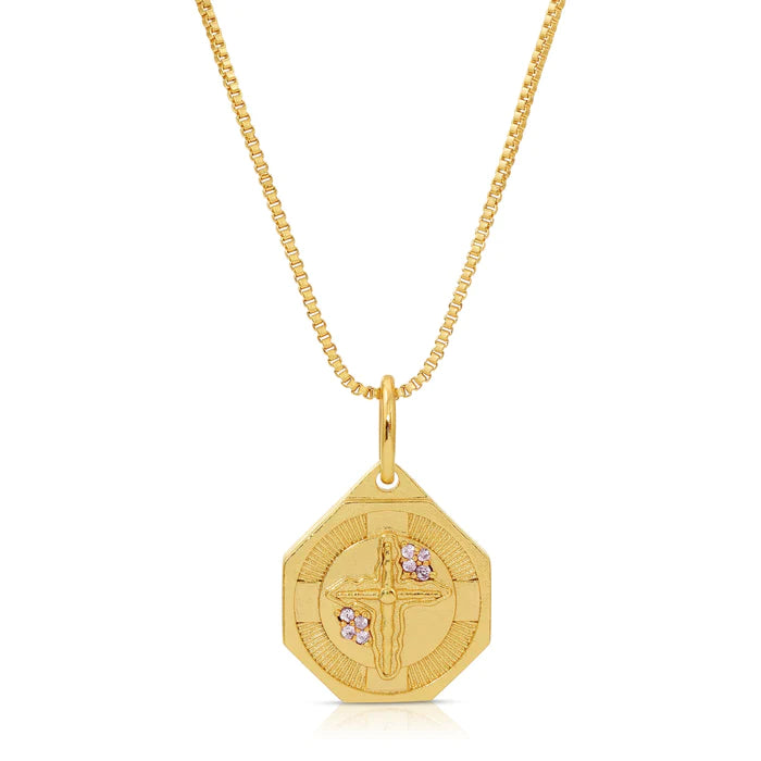 This is a double-sided stunning necklace. One side features a vintage cross accented with dainty pink cubic zirconia, while the other side features stunning enamel over Jesus.  Hold Jesus close to your heart with this beautifully unique necklace.  Colors- Gold, pink, blue. Double sided. Pink Cubic Zirconia. French blue enamel. 14k gold plate over brass.