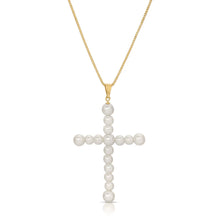 Load image into Gallery viewer, Our Vivian Pearl Cross Necklace is an attention grabber with its gorgeous array of faux pearls in a cross design.  A bold piece to wear alone or layer with your favorite necklaces, this will become one of your favorite go to necklaces.  Color- Gold and white. Faux pearls. Twenty inch box chain. 14 kt gold plate over brass.

