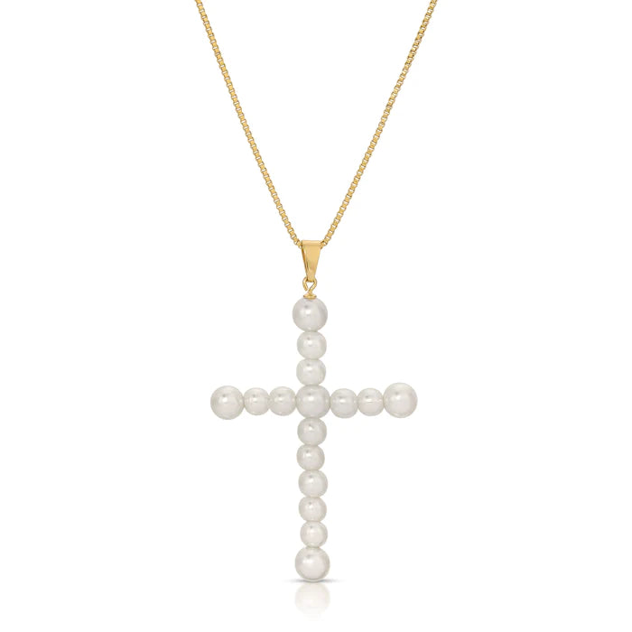 Our Vivian Pearl Cross Necklace is an attention grabber with its gorgeous array of faux pearls in a cross design.  A bold piece to wear alone or layer with your favorite necklaces, this will become one of your favorite go to necklaces.  Color- Gold and white. Faux pearls. Twenty inch box chain. 14 kt gold plate over brass.