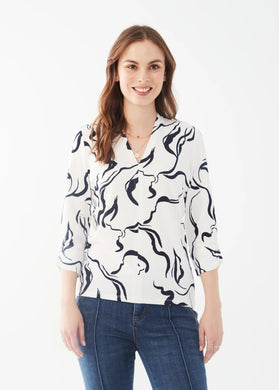 This lovely top effortlessly blends fashion and art, boasting a distinctive print that makes a daring statement. Crafted with superior stretch and a luxurious texture, it's a must-have addition to elevate your wardrobe.