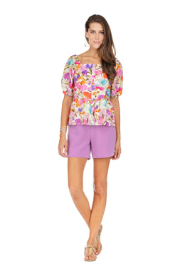 A spectacular watercolor garden print in a variety of spring/summer colors create a lovely top that will be sure to give you compliments!  With its attractive square neck, button down design and slight peplum bottom, this feminine top pairs beautifully with many of your favorite bottoms.    Create the perfect outfit when paired with our LILY LILAC SHORTS - JADE MELODY TAM.  Colors- Shades of purples, red, blue, green, tan, pink, white. Button down. Square neck. Slight peplum bottom.