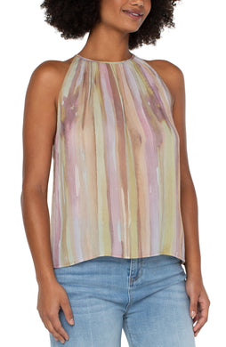 Beautiful pastel watercolor hues stand out beautifully on this statement making top.  A feminine halter style will effortlessly take you from day to evening events.  Pairs beautifully with neutral trousers or denim.  Color- Watercolor print; Pinks, greens, lilac, tan. Sleeveless. Mock neck. Button back closure. Liverpool Exclusive print.