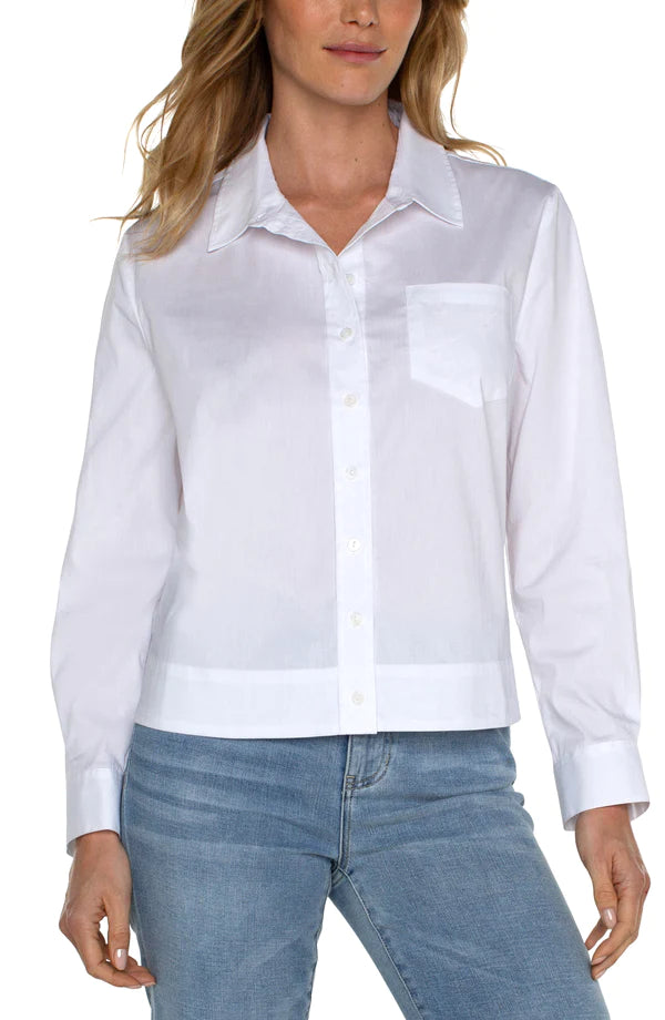 The Winslow White Button Front Shirt features a new elastic back waist to enhance any figure and ensure optimal comfort. This modern interpretation of a timeless piece makes it a must-have for any wardrobe.  Color- White. Button front shirt.. Elastic at back waist. Long sleeve.