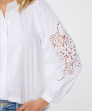 Load image into Gallery viewer, The Wita White Blouse Lace Sleeve by EsQualo features a striking openwork design on its sleeves, making it a standout choice. Its classic white color allows for versatile pairing with a variety of pants and skirts.
