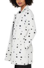 Load image into Gallery viewer, You&#39;ll stay cozy warm when temperatures drop while feeling effortlessly stylish in this unique cardigan with a black dot pattern on a white background. The open front sweater cardigan provides a great opportunity to create an array of fashionable looks, like teaming it with a black top and denim for a laid-back chic ensemble or darker bottoms, skirt or dress for a more elevated look.  Color- White with black dots. Open front. Fuzzy sweater knit. Collared. Front slit functional pockets.
