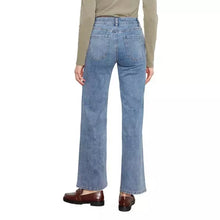 Load image into Gallery viewer, A person shown from the back wearing light blue wide-leg jeans, a beige long-sleeve top, and brown loafers against a plain white background.

