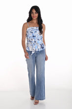 Load image into Gallery viewer, Elevate your wardrobe with this chic and versatile Woven Denim Pant by Frank Lyman. Crafted in a timeless blue hue, these pants feature stylish chain and fray fabric detailing on the pockets, adding a touch of sophistication to your look. Designed with premium-quality fabric, they offer both comfort and durability, making them perfect for everyday wear or special occasions. Pair them with your favorite blouse or jacket to create a standout outfit that&#39;s ready to impress.
