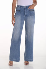 Load image into Gallery viewer, Elevate your wardrobe with this chic and versatile Woven Denim Pant by Frank Lyman. Crafted in a timeless blue hue, these pants feature stylish chain and fray fabric detailing on the pockets, adding a touch of sophistication to your look. Designed with premium-quality fabric, they offer both comfort and durability, making them perfect for everyday wear or special occasions. Pair them with your favorite blouse or jacket to create a standout outfit that&#39;s ready to impress.
