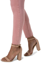 Load image into Gallery viewer, Liverpool&#39;s classic Abby Skinny is now in a color that we just adore!  A beautiful vibrant wash in rose blush color just catches the eye!  With its amazing stretch and recovery, this Abby Skinny will easily become one of your favorites. Pair with your choice of top and sandal for a perfect spring/summer outfit.  Color- Rose Blush. Mid-rise. Cut hem. Amazing stretch and recovery.
