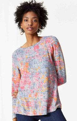 A colorful unique novelty top, perfect for matching with just about any solid color, is a perfect style to add a pop of color into your life.  Our Alena is an easy knit long-sleeved pullover shape that sits at the hip. We love the textured appearance and the random interplay of the colors.