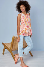 Load image into Gallery viewer, ur Silvia is a super stylish and undeniably comfortable straight-leg jean with a mid-rise fit.  The stand-out feature are the side slits at the hem emphasized with embroidered light orange and bright pink detailing. A perfect jean that goes with so many tops including our  Farah Flutter Sleeve Textured Blouse with Tassels by Tribal (pictured)  Color - Coastline; Light blue. Side slits with embroidery in light orange and bright pink. Mid-rise. Zipper and button closure. Functional front and back pockets.
