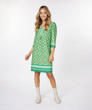 Load image into Gallery viewer, Make a fashion statement with EsQualo&#39;s best-selling dress!  This favorite has a mod inspired all-over &quot;70&#39;s&quot; print in a brilliant green color. A flattering v-neckline and flattering fit, our Bridget features lime green beading that catches the eye.   Color- Mod green; Various shade of green and white. Inspired 70&#39;s print. V-Neck with green beading. Wide fit. Pull-over.
