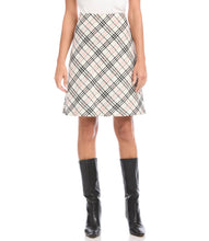 Load image into Gallery viewer, Polished in plaid, this bias-cut tartan skirt offers a figure-flattering silhouette. This skirt pairs perfectly with our Rose Drape Neck Turtleneck Lightweight Sweater.

