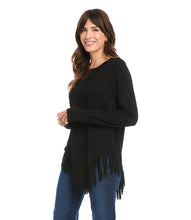 Load image into Gallery viewer, The fringe details on the hem of this super soft top cut from jersey-knit is just all that! A fashionable top our Blair can easily transition from day to evening.  Color- Black. Perfect coverage. Long sleeve. Round neck. Fringe hem.
