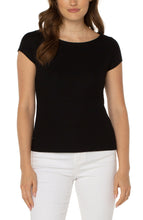 Load image into Gallery viewer, This is the perfect baby tee that your wardrobe has been waiting for! Textured to add interest, our Bailey in black essentially goes with every bottom, jacket, blazer in your closet. With its cap sleeves and boat neck, our Bailey tee is super comfortable and easy to wear.  Color- Black. Large and mini rib knit. Boat neck. Cap sleeve. Straight hem finish.
