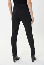 Load image into Gallery viewer, Black slim fit, straight cut jeans are taken up a notch with black rhinestone detailing at the ankle and side of our chic Ember jean.  Frayed hem at the ankle adds even greater interest and style.  A perfectly fabulous jean, the Ember pairs perfectly with so many of your favorite tops.  Color- Black. Classic slim jean. Embellishment details at top side and at ankles. Frayed hem at ankle. Fabric-66% Cotton. 21 % Polyester. 1
