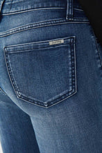Load image into Gallery viewer, As unique as it is bold, our basic blue denim jean by Joseph Ribkoff is taken to new heights with its bold scribble pattern in black rhinestone embellishment.  A perfect statement piece to pair with your favorite top, you will definitely receive compliments on this fabulous jean.
