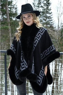 A fabulous cape will always elevate an outfit.  The knit Kalen Cape from Frank Lyman has faux fur trim and a single enclosure. A perfect alternative to wearing a jacket or coat, the Kalen can be worn with a dress for a special occasion or with your leggings and sweater for a trendy look.  Color- Black and grey. Faux fur trim. Geometric pattern. Single enclosure. Fabric-100% Acrylic.