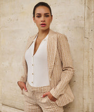 Load image into Gallery viewer, Not your ordinary blazer, this blazer by EsQualo offers a fabulous block print in sand color. Our Sienna has a button closure and a relaxed fit. Wear with a white t-shirt for a casual look or style or dress up with a blouse.
