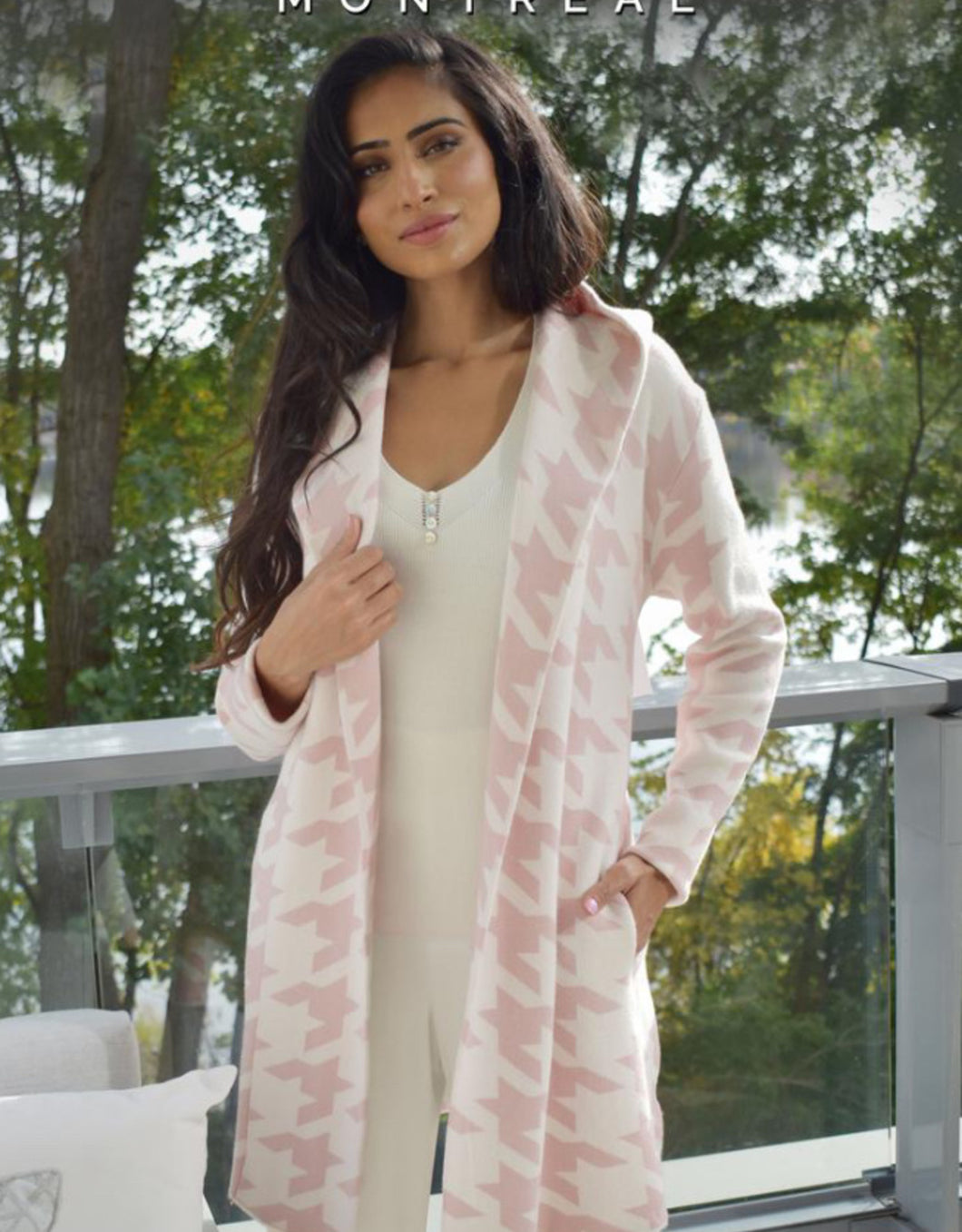 Simply stunning describes this pink and white hooded open cardigan. A perfect style to transition between seasons, you will feel and look like a fashionista when you put on this uniquely fabulous cardigan with an abstract pattern.  Pairs beautifully with blue or white denim.