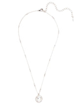 Load image into Gallery viewer, All around allure. This necklace features a rounded-edge, cushion cut stone that is encircled by a vintage inspired decorative edged border. A delicate chain completes the look. 
