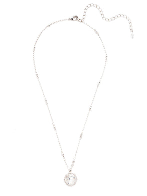 All around allure. This necklace features a rounded-edge, cushion cut stone that is encircled by a vintage inspired decorative edged border. A delicate chain completes the look. 
