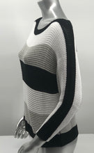 Load image into Gallery viewer, For those cool summer nights, or Caryl sweater is the perfect piece to keep warm.  Not too heavy and not too light, this knit sweater is fashionable and functional.  The colorblock colors in white, gray and black are so on trend and literally goes with so many different bottoms.  As this 3/4 sleeve sweater is not a tight knit, it is slightly see-through.  Wear over a bralette, tank or nude bra if preferred.  
