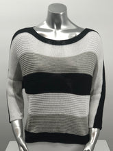 Load image into Gallery viewer, For those cool summer nights, or Caryl sweater is the perfect piece to keep warm.  Not too heavy and not too light, this knit sweater is fashionable and functional.  The colorblock colors in white, gray and black are so on trend and literally goes with so many different bottoms.  As this 3/4 sleeve sweater is not a tight knit, it is slightly see-through.  Wear over a bralette, tank or nude bra if preferred.  
