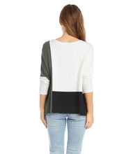 Load image into Gallery viewer, Our Darcy dolman top has colorblock panels that flatter your figure while offering a fabulous modern touch. The dolman sleeves and relaxed top offers a generous fit that creates an ultra-comfortable top to wear.  Pairs wonderfully with denim, black or white bottoms. Color- Colorblock in white, black and olive. Three quarter sleeves. Dolman sleeves. Relaxed, generous fit.
