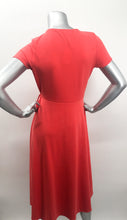 Load image into Gallery viewer, Look absolutely stunning in this vibrant red-orange modal dress by Mimi K.  The Willow dress, made of Modal fabric, is lightweight, stretchy, and breathable and doesn&#39;t wrinkle easy, making it a travel worthy piece.  Willow has a look of a wrap dress but is actually one piece with a tie on the side. 
