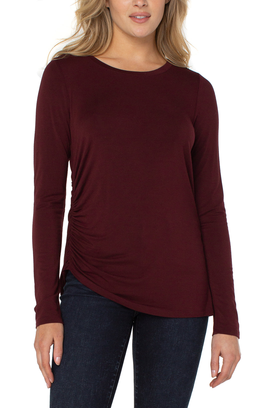 This long sleeve modal knit top features side shirring for a truly flattering fit. This perfect stretch top is easy enough to wear alone or style under your favorite jacket or cardigan.  